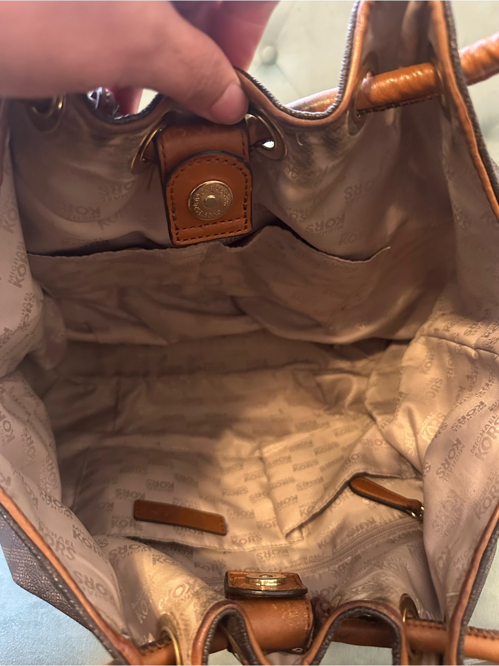 Michael Kors Brown Monogram Bucket Bag with Tassel Charm - Picture 3 of 3